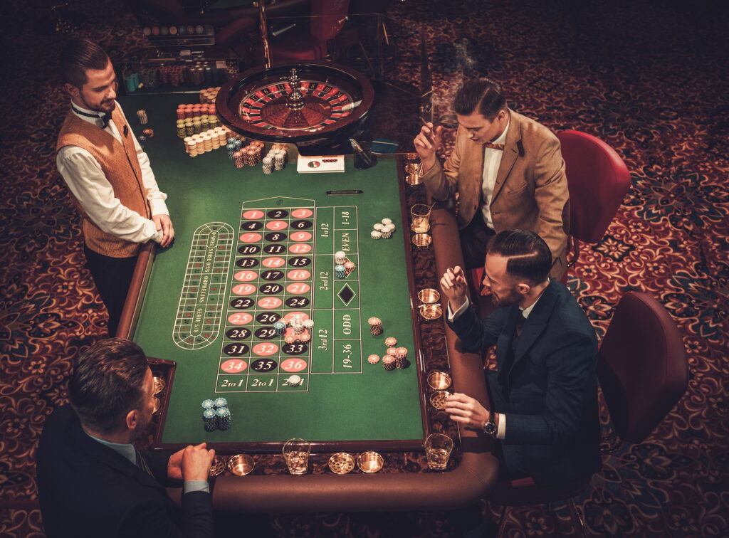 Upper class friends gambling in a casino